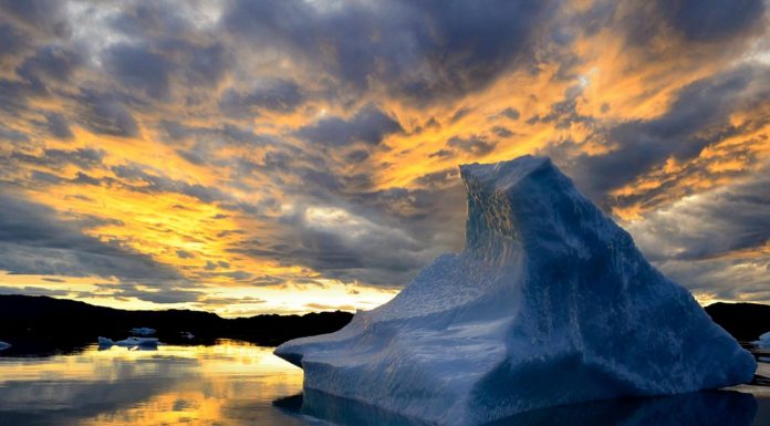 FROM SNOWFLAKE TO ICEBERG Iceberg in sunset, by Ole J. Petersen